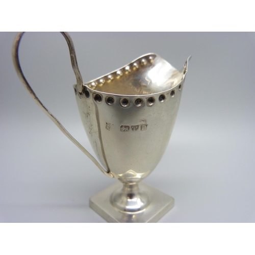 867 - A silver helmet shaped cream jug, Chester 1898, 61g