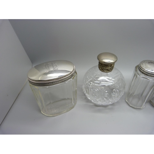 874 - Four vintage silver topped jars and a cut glass perfume bottle