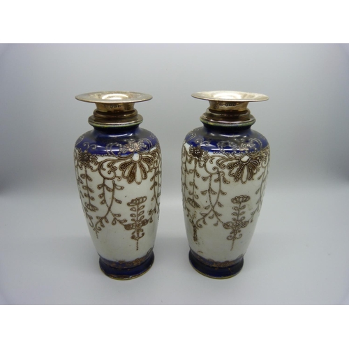 876 - A pair of silver topped Japanese vases, Birmingham 1945 hallmark