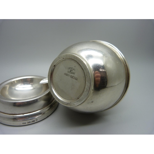 878 - A silver sugar shaker, 142g and a silver ashtray