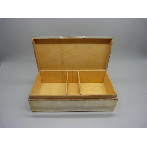 884 - A silver cigarette box with cedar lining, 528g gross