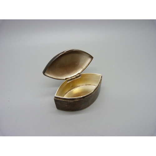 890 - A silver navette shaped pot, 54g