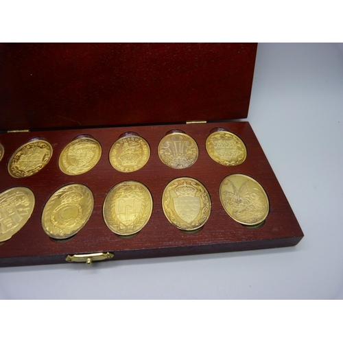 914 - Twelve medallions, The Arms of The Prince and Princess of Wales, boxed and hallmarked, 171g