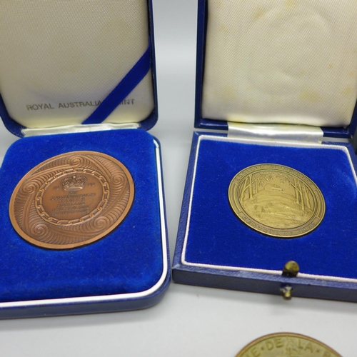 921 - A collection of medallions; four Australia and Pope John Paul II