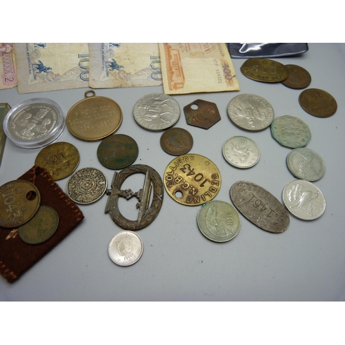 925 - A German badge, lacking pin, colliery tokens including Gedling, coins and banknotes