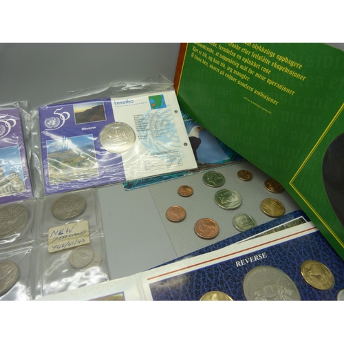 927 - Nine sets of uncirculated coins from around the world