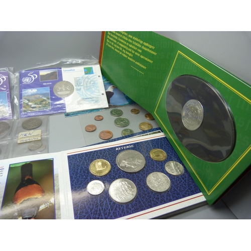 927 - Nine sets of uncirculated coins from around the world