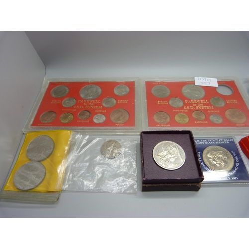 934 - A collection of British pre-decimal coins, crowns, a £5 coin and two badges