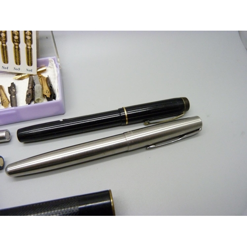 942 - A collection of pens including Parker