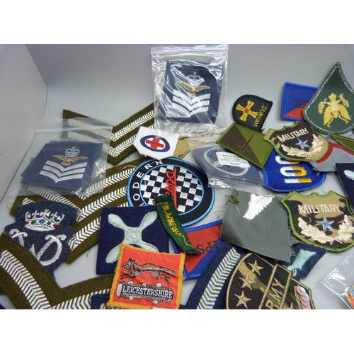 946 - Military buttons and insignias, etc.