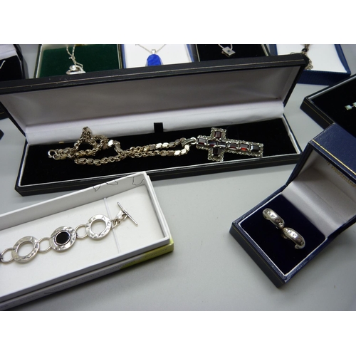 950 - Assorted boxed silver jewellery including a silver and stone set cross and chain, silver pendants an... 