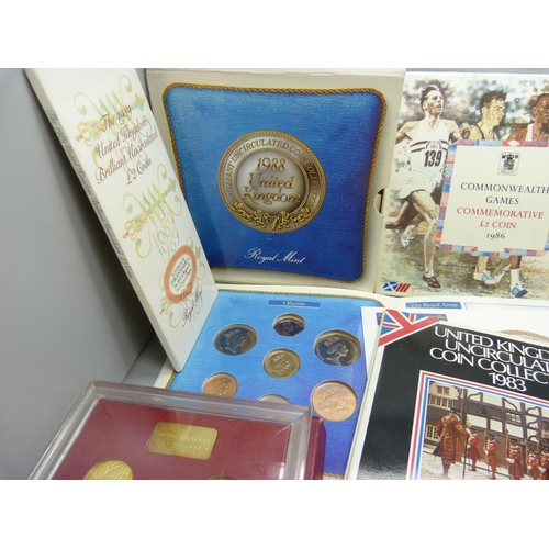 962 - A collection of commemorative crowns and coins and two medals, a cartwheel two-penny and penny coins... 