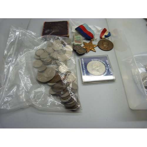 962 - A collection of commemorative crowns and coins and two medals, a cartwheel two-penny and penny coins... 