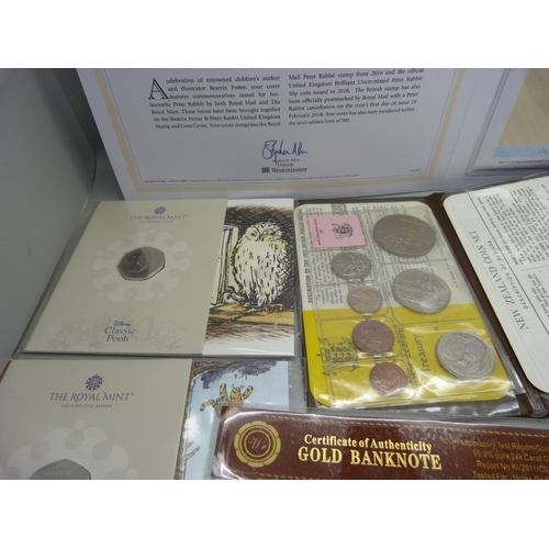 964 - A folder of Pantomime commemorative cover collection coins and a collection of British and foreign c... 