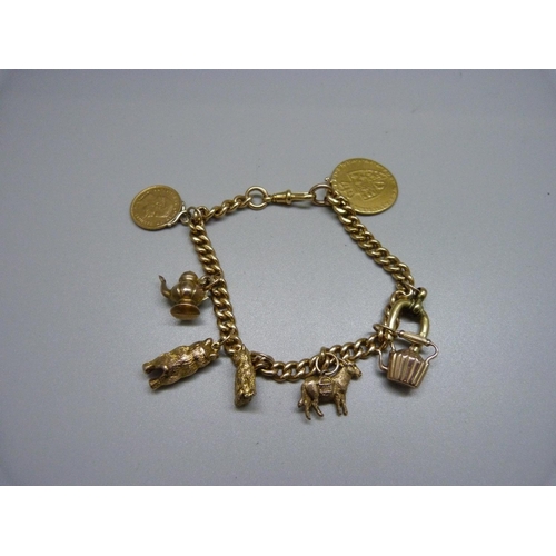 989 - A 9ct gold bracelet with George III spade Guinea, an 1874 10 kroner coin, two 9ct gold charms and fo... 