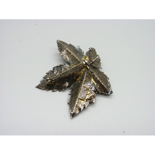 996 - A Danish silver and gold dipped leaf brooch, boxed