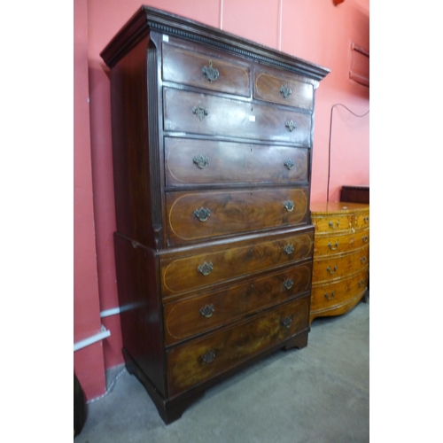 26 - A George III inlaid mahogany chest on chest