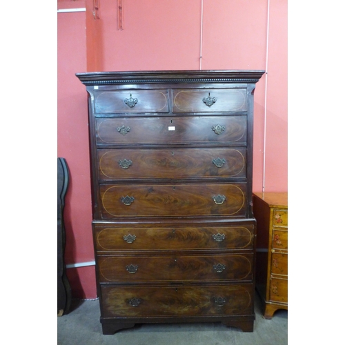 26 - A George III inlaid mahogany chest on chest