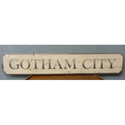 368 - A wooden Gotham City sign