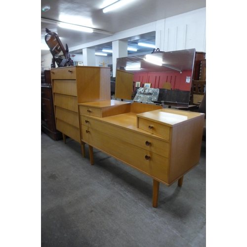 42 - An Avalon Yatton teak two piece bedroom suite