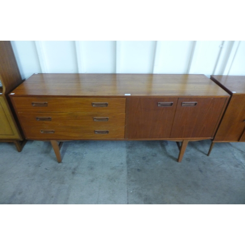 44 - A teak sideboard