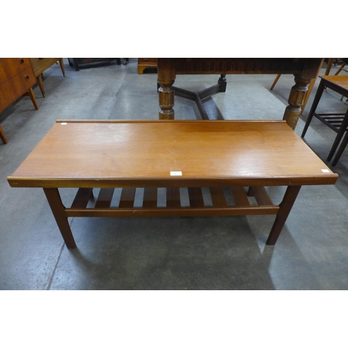 47 - A teak coffee table