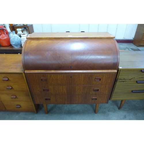 49 - A Swedish S.M.I. teak cylinder bureau, designed by Egon Ostergaard