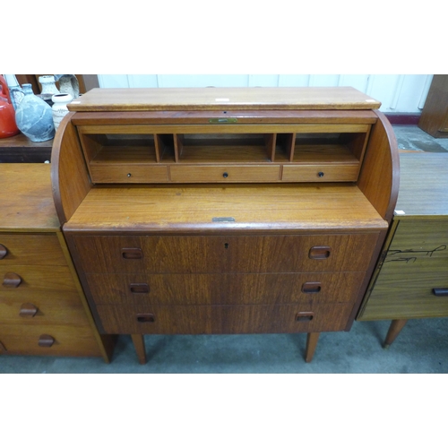 49 - A Swedish S.M.I. teak cylinder bureau, designed by Egon Ostergaard