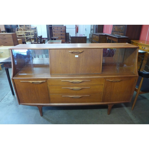 64 - A Jentique teak highboard