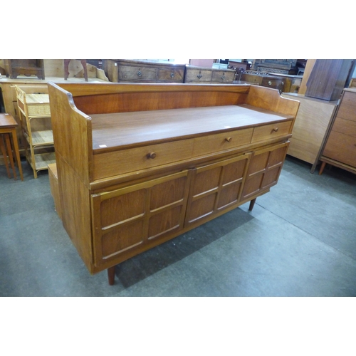 76 - A Nathan teak highboard