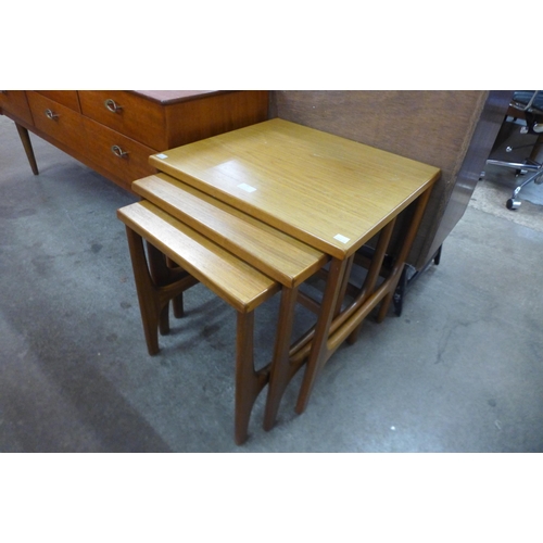 77 - A teak nest of tables