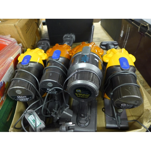 2108 - 4 Hand held Dyson vacuum cleaners - all with chargers and cleaning heads