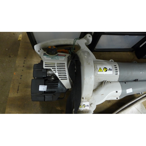 2113 - Ryobi mulching blower vacuum - W but engine needs service/cleaning for optimal output