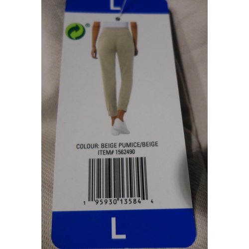 3126 - 10 Pairs of women's 32° Cool cream joggers, size XL * this lot is subject to VAT