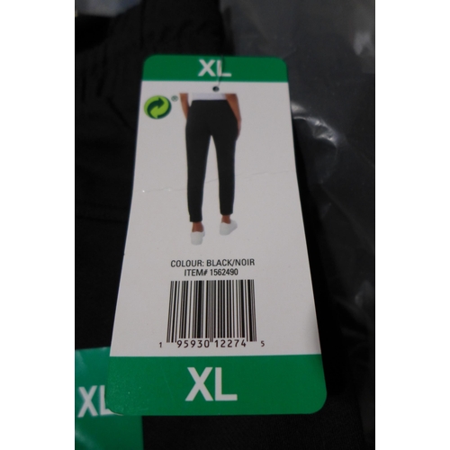 3130 - 10 Pairs of women's 32° Cool black joggers, size XL * this lot is subject to VAT