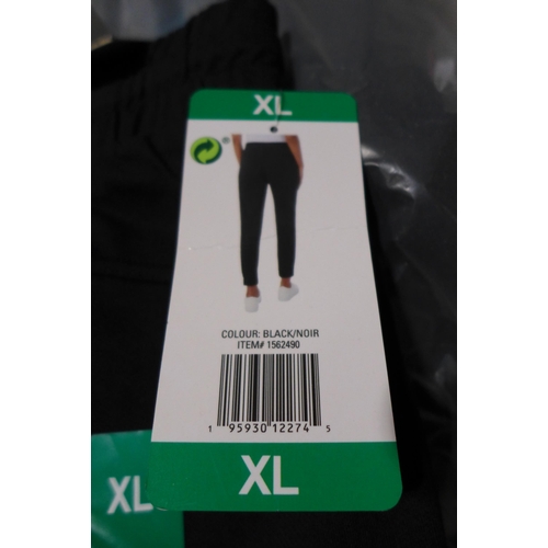 3132 - 10 Pairs of women's 32° Cool black joggers, size XL * this lot is subject to VAT