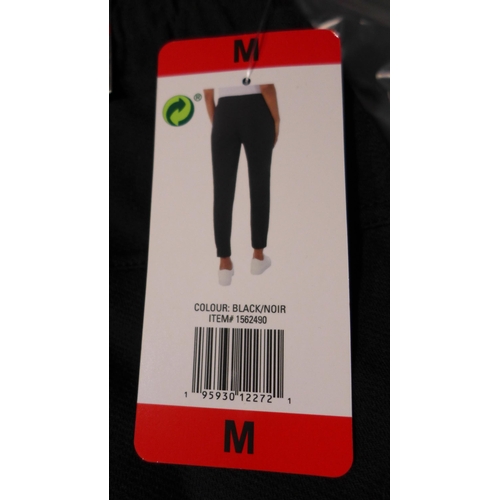 3135 - 10 Pairs of women's 32° Cool black joggers, size M * this lot is subject to VAT