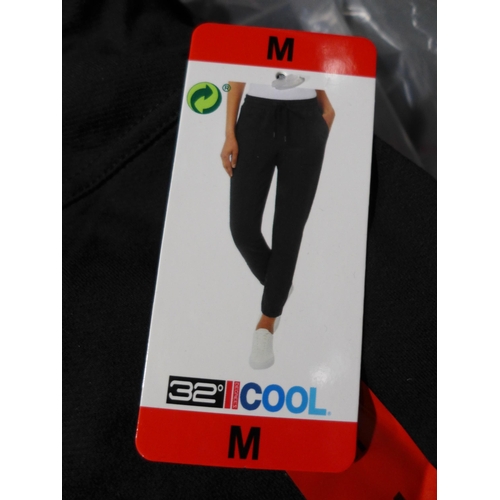 3140 - 10 Pairs of women's 32° Cool, black medium joggers * this lot is subject to VAT