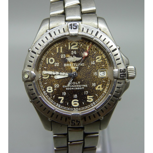 894 - A Breitling Colt chronometre wristwatch with box and papers, a/f, water damage