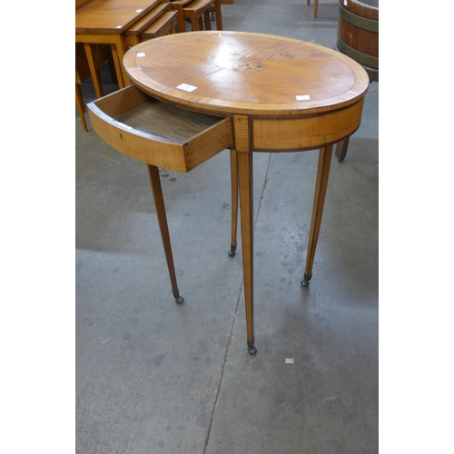 286 - An Edward VII inlaid satinwood oval single drawer occasional table