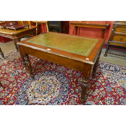 182 - A Victorian mahogany and green leather topped library table