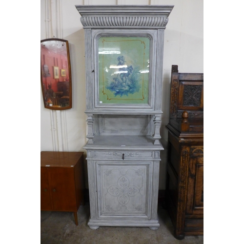 204 - A French painted oak pier cabinet