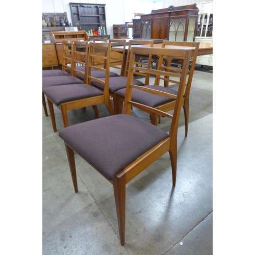 24 - A set of eight McIntosh teak dining chairs