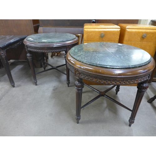 246 - A pair of French style circular beech and marble topped lamp tables