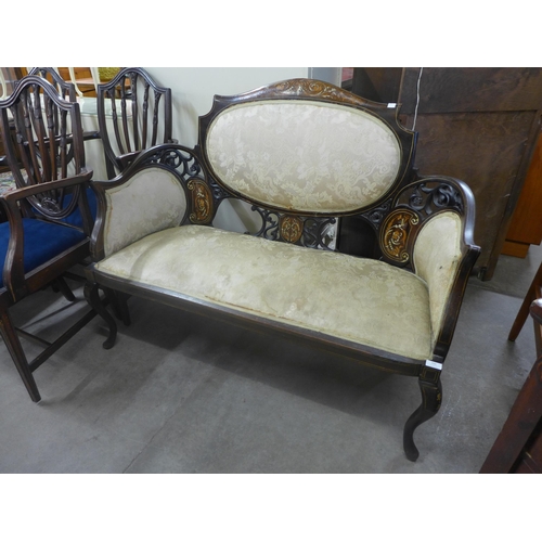 256 - An Edward VII inlaid mahogany and fabric upholstered settee. This lot is for sale with non-transfera... 