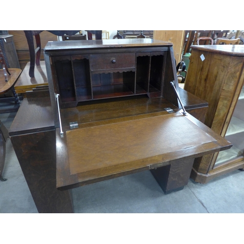 258 - An Art Deco oak bureau bookcase