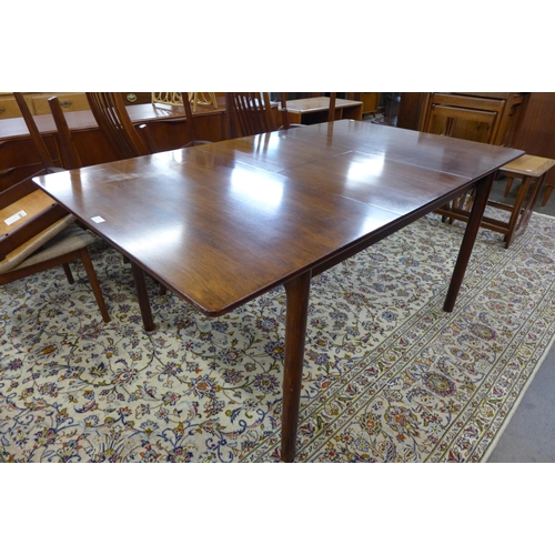 28 - A McIntosh mahogany extending dining table