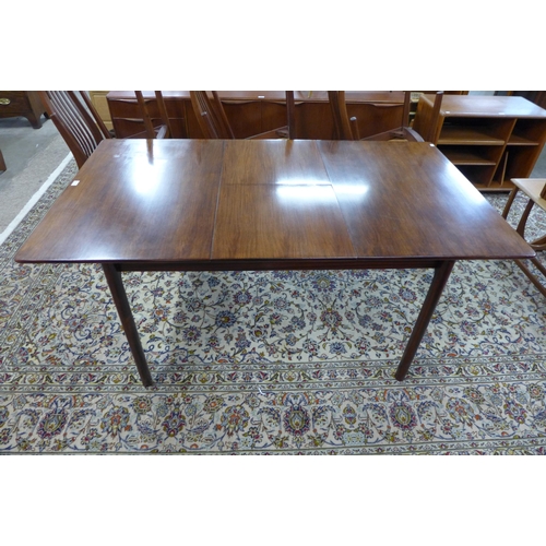 28 - A McIntosh mahogany extending dining table