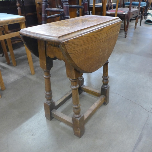 281 - Three stools, a bentwood chair and a small oak drop-leaf occasional table