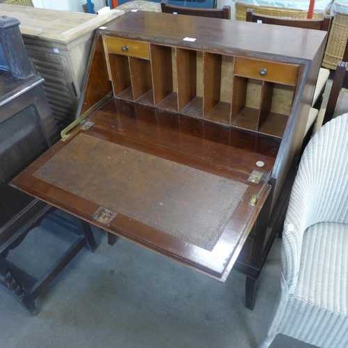 302 - An inlaid mahogany bureau